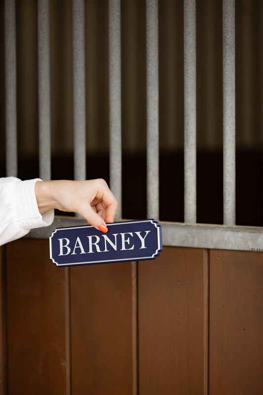 SnapTack magnetic name plate snapping instantly onto a metal stable door