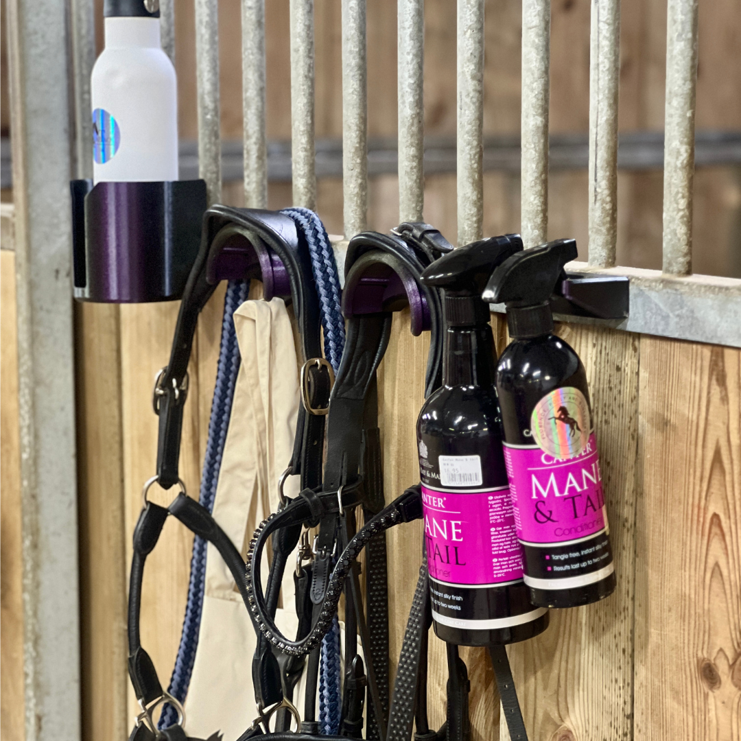 SnapTack magnetic bridle holder with hook for equestrian tack storage mulberry in use