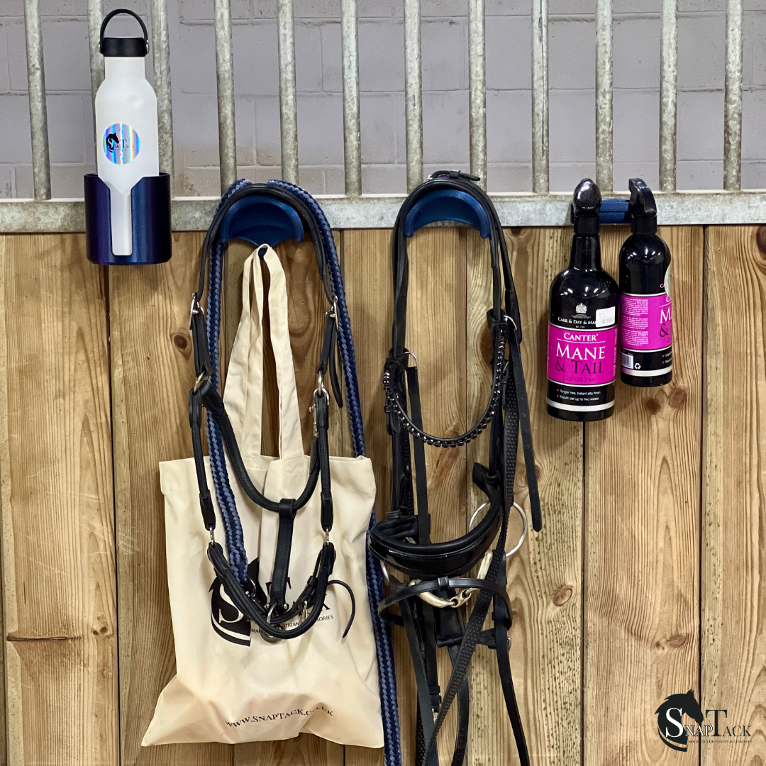 SnapTack magnetic bridle holder with hook for equestrian tack storage sapphire in use